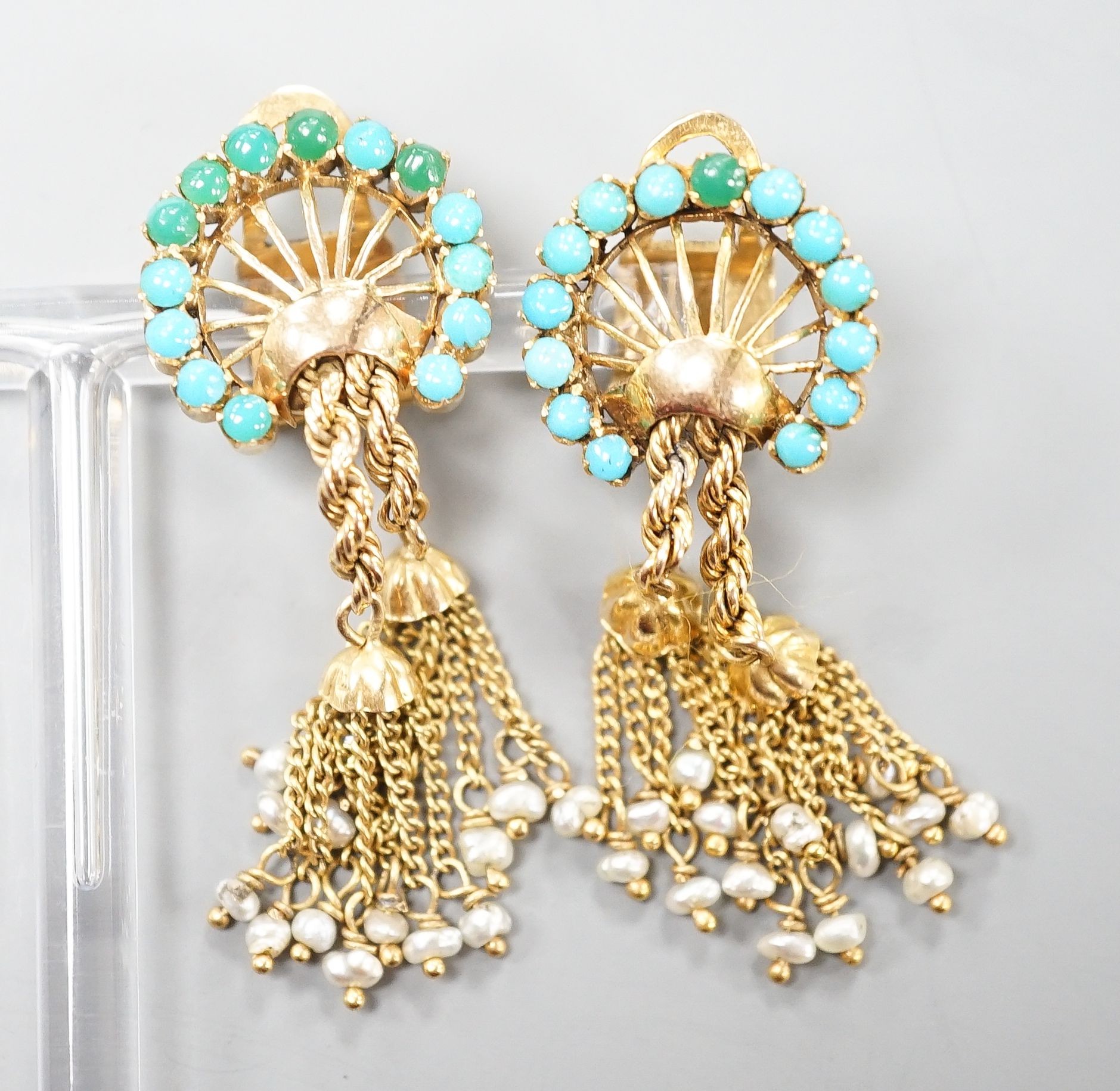 A pair of 20th century Middle Eastern yellow metal, seed pearl and turquoise set tassel drop ear clips, 47mm, gross weight 12.5 grams.